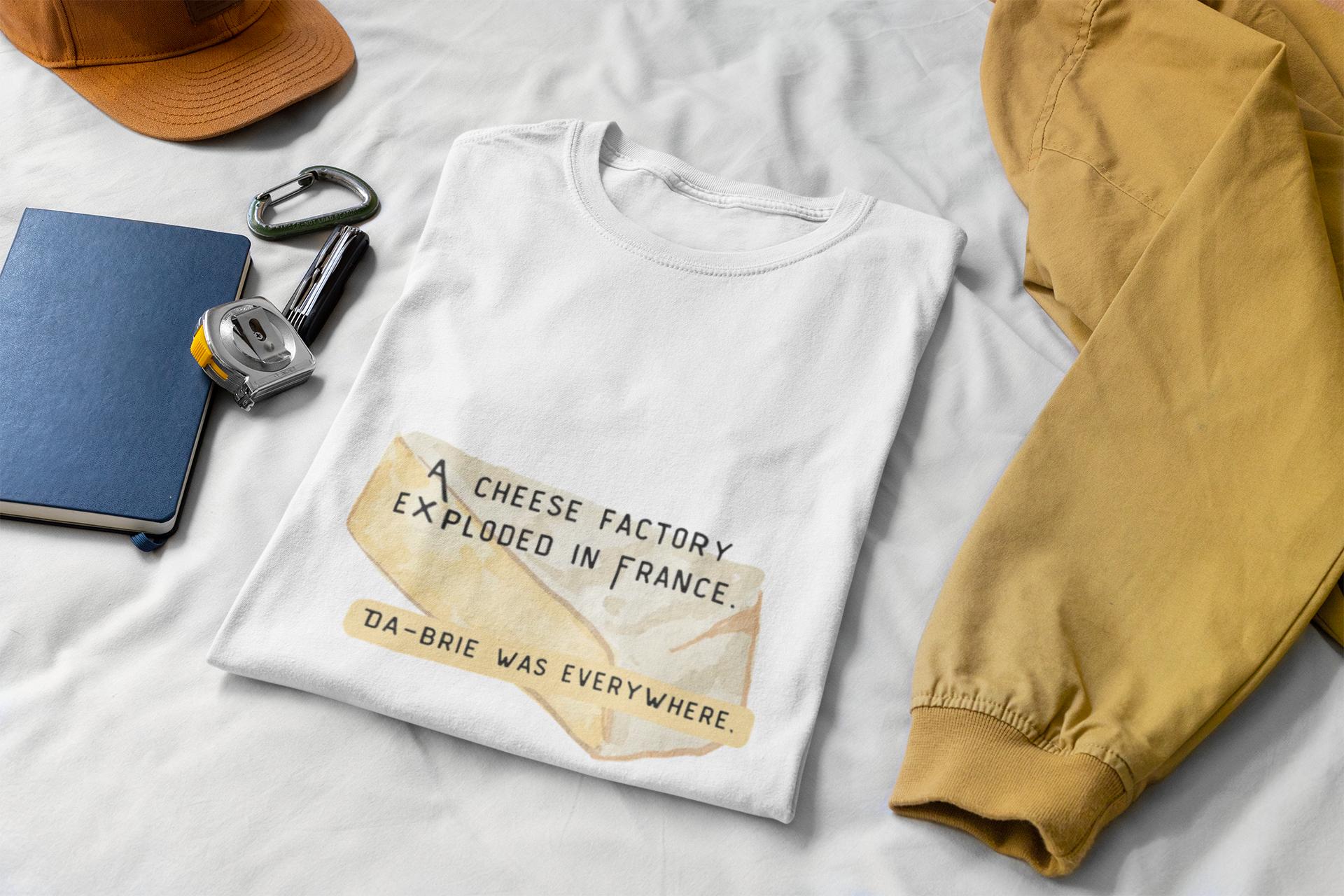 Funny Cheese Pun T-Shirt — "A Cheese Factory Exploded in France, Da-brie Was Everywhere" - Dad Joke Tee